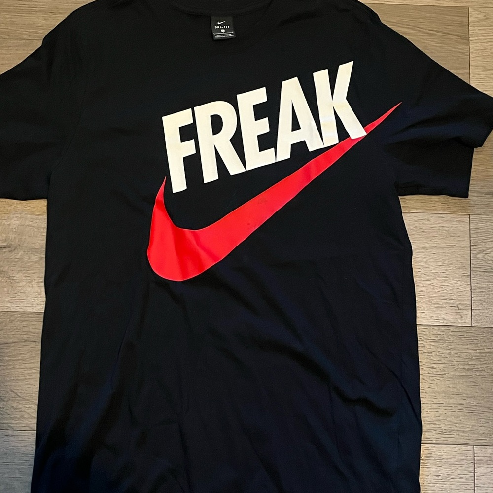 Nike Men's Black Tee with Red Swoosh and White Text